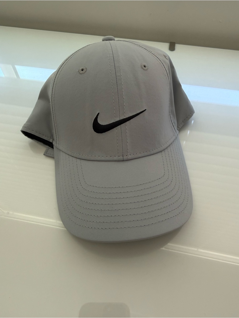 Nike Light Gray Cap with Black Swoosh